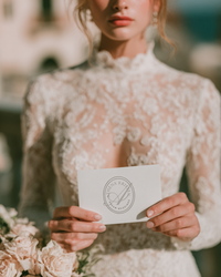 Athena Kristen wedding planner brand identity suite featuring elegant stationery, logo variations, floral imagery, business cards, and monogram details in a soft, romantic palette.