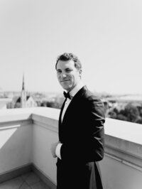 A groom on the rooftop of The Hotel Bennett in Charleston, SC