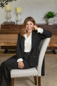 Female entrepreneur smiling in a professional brand portrait photographed by Ventura County brand photographer Jaclyn Hernandez.