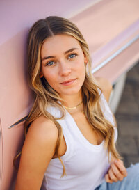 Senior portrait in Gulf Shores, Alabama — pink car
