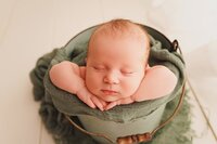 Minimalist newborn baby portrait at Elk Grove studio in soft neutral style