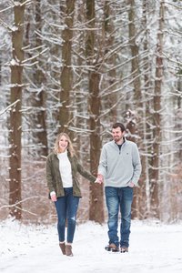 snowy winter engagement photos at quailhollow state park in hartville ohio photographed by Jamie Lynette Photography Canton Ohio Wedding and Senior Photographer