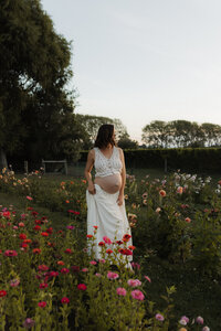 maternity session among dahlias in Christchurch