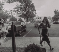 guests escaping rain before wedding ceremony at cathedral, catholic wedding, documentary wedding photographer, cinematic wedding photographer, black and white, vintage, candid, untraditional, nyc wedding photographer, new york wedding photographer, east coast wedding photographer