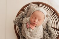 Beautiful newborn portraits in Elk Grove and Sacramento, capturing your baby's precious moments with simple elegance. Book your session today
