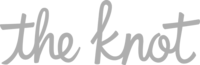 The "Destination Wedding Photographers" logo in a cursive, handwritten style font.