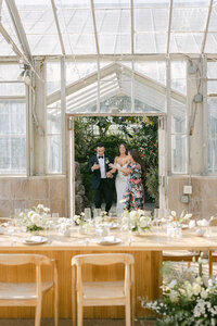 Krissy Allegra of Always Allegra Events, Lead Planner and Owner, doing a grand reveal of the reception for a bride and groom