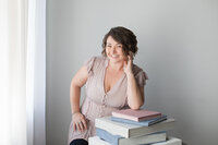 Ocean County photographer Marianne Bley with custom portrait albums