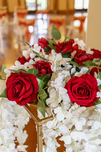 Venice Beach wedding photography detail shot of fresh roses in the bridal floral decor near Venice Beach Los Angeles, captured in true to life color with soft natural light and fine art styling.