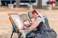 Emotional moment of a bride looks at the portrait of her mom's wedding