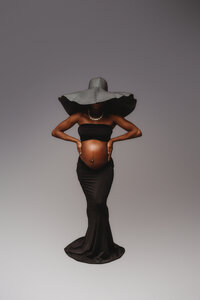 Pregnant woman poses for studio Maternity Portraits at Holy City Babies Portrait Studio in Charleston, SC.