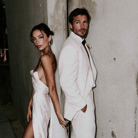 superherodesignco_34572_Bride_and_groom_standing_back_to_back_33c906d1-1aa4-40d2-8fb1-df6e82078f37_2