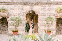 couple hugging each other in Miami at Vizcaya