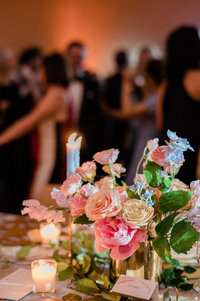 Pink florals sit on top of William Vale wedding reception