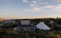 Aerial view of private home with wedding reception tent on Nantucket.