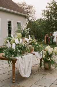 Elegant film photography portrait showcasing sophisticated wedding photography at Lion Rock Farm venue. Lauren Alatriste combines fashion photography aesthetics with authentic documentation, creating magazine-worthy celebration imagery.