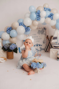 Baby celebrates her 1st birthday with a Cake Smash Photoshoot at Holy City Babies Portrait Studio in Charleston, SC.