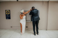 City Hall Couple Plays on Payphones