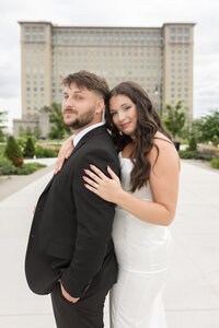man and woman posing in Downtown Detroit Engagement Photography Savvy Shoots