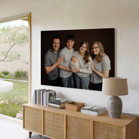 Large framed family portrait with newborn displayed above a modern console table, Kaitlyn Dawn Photography, Yucaipa family and newborn photographer.