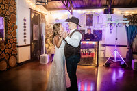 Bride and Groom candid first dance at Azle Deer Cove captured by Graceful Ray Photography