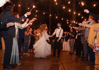 Exit walk with sparklers during wedding at Camp Colton in Colton Oregon