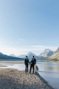 Couple walking around at a lake in the canadian rockies