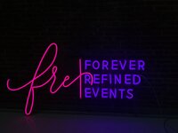 a san diego wedding planner branded a neon sign
