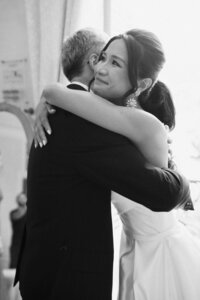 Bride Dad Hug | Chateau de Santeny Luxury Wedding Photography France | Juno by Julia C. Vona