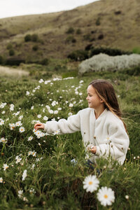 Family photographer in Christchurch among the wildflowers