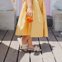 walking in skirt yellow