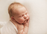 Newborn posed for Baby Photos in Charleston, SC.