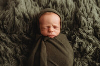 Newborn Photographer in Charleston - Newborn Baby sleeping during Newborn Portrait Session in Charleston, SC.