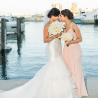 Destination Wedding Photography of Bide & Daughter: Photo of bride and her daughter at the pier in downtown Miami | captured for White House Wedding Photography
