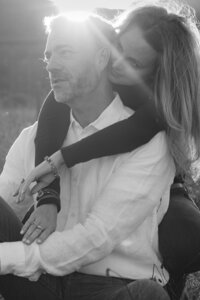 playful couple sunset engagement photos by the golden gate bridge at cavallo point