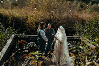 Newly married couple doing documentary and cinematic photos for their wedding / elopement at their blue ridge airbnb. Photos by Crimson Conure Photography based in Kennesaw, Georgia and Denver, Colorado