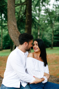 couple-smiling-at-engagement-shoot-at-hampton-manor-by-leslie-choucard-photography