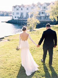 Bride and groom walking along at outdoor wedding in Halifax Nova Scotia