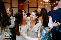 bride dancing with guest