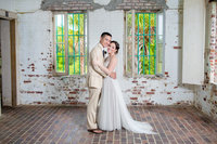 bride and grrom in atalaya castle in huntington beach state park