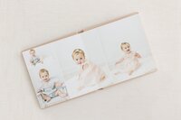 milestone album laid open showing 6 month photos