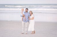 Family session on the beach, white neutral and blue outfit