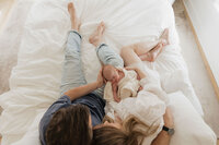 overhead-wide-parents-newborn-bed-airy-in-home-boulder-photographer-81