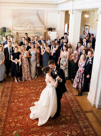 A wide architectural view of a first dance at Cairnwood Estate, capturing the natural unfolding of the evening with a refined, documentary eye.