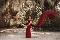 Maternity Photos in Charleston, SC -- Expectant mother poses for Maternity Portraits at Hampton Park in downtown Charleston, SC.