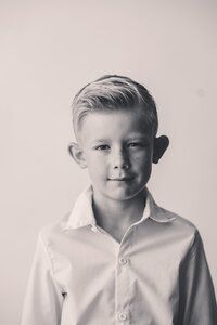 Young boy peers at the camera during Personality Pictures in Charleston.