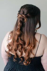 Experienced stylists at SoCo crafting the Mid-Town look with detailed iron work and professional finishing spray