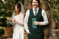 a groom closes his eyes during his private vows with his bride