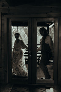 Newly married couple doing documentary and cinematic photos for their wedding / elopement at their blue ridge airbnb. Photos by Crimson Conure Photography based in Kennesaw, Georgia and Denver, Colorado