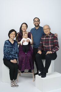 Multi-generational family portrait with grandparents and grandchildren in our Edmonton studio